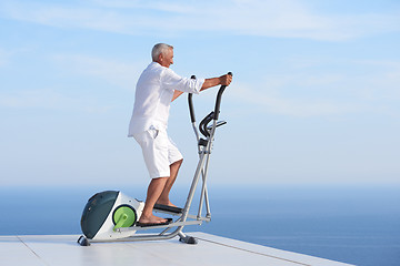 Image showing healthy senior man working out