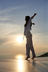 Image showing young woman enjoy sunset