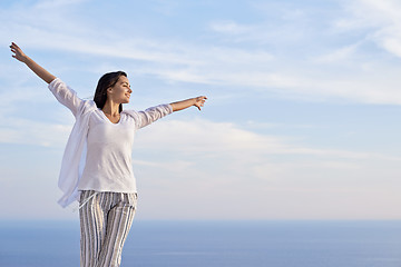 Image showing young woman enjoy sunset