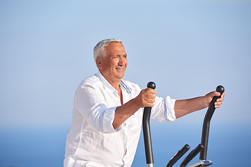 Image showing healthy senior man working out