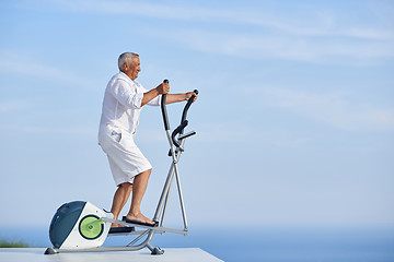 Image showing healthy senior man working out