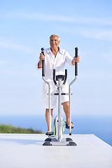 Image showing healthy senior man working out