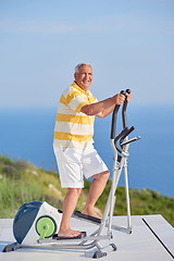 Image showing healthy senior man working out