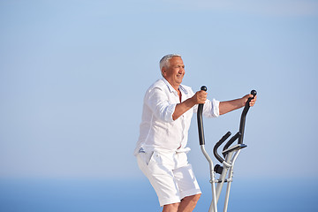 Image showing healthy senior man working out