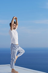 Image showing young man practicing yoga