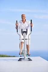 Image showing healthy senior man working out