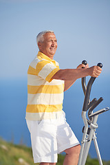 Image showing healthy senior man working out