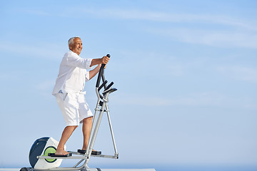 Image showing healthy senior man working out