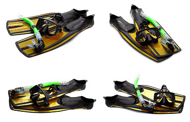 Image showing Set of yellow swim fins, mask and snorkel for diving on white ba