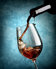 Image showing Wine on blue background