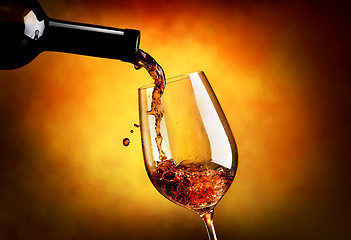 Image showing Wine on orange background