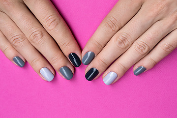 Image showing Delicate female hands with a stylish neutral manicure