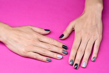 Image showing Delicate female hands with a stylish neutral manicure