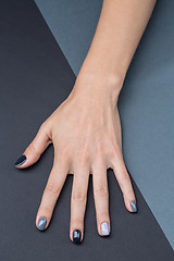 Image showing Female hand with a stylish neutral manicure