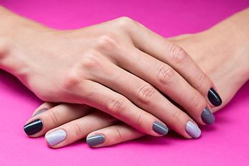 Image showing Delicate female hands with a stylish neutral manicure