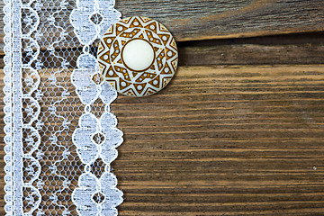 Image showing vintage lace with a brooch