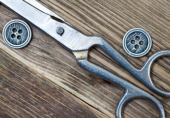 Image showing vintage buttons and a dressmaker scissors