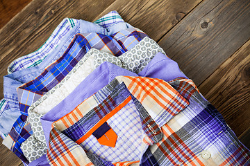 Image showing shirts in a stack