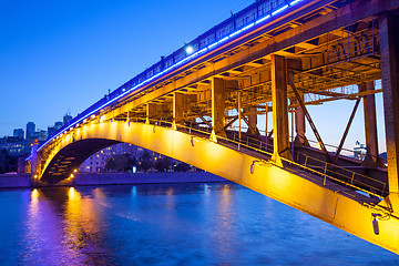 Image showing Night urban landscape with old Smolensky Metro Bridge in Moscow