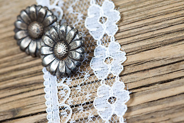 Image showing vintage button and lace tape