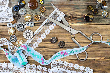 Image showing aged lace, vintage buttons and a dressmaker scissors