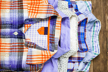 Image showing shirts in pile