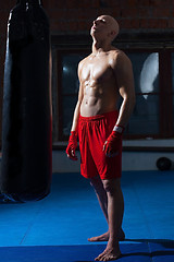 Image showing athlete in red shorts