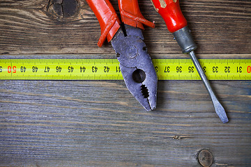 Image showing vintage pliers and old screwdriver