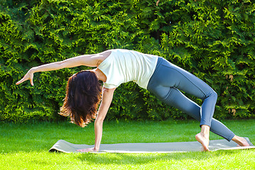 Image showing beautiful woman doing yoga