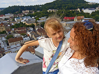 Image showing Daughter and mother on the downtown background