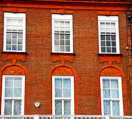 Image showing in europe london old red brick wall and      historical window