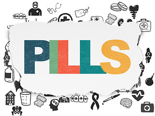 Image showing Health concept: Pills on Torn Paper background