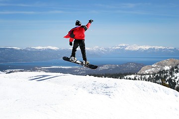 Image showing Snowboarder enjoying a view