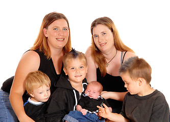 Image showing Two family\'s and a little baby.