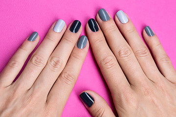 Image showing Delicate female hands with a stylish neutral manicure