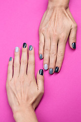 Image showing Delicate female hands with a stylish neutral manicure