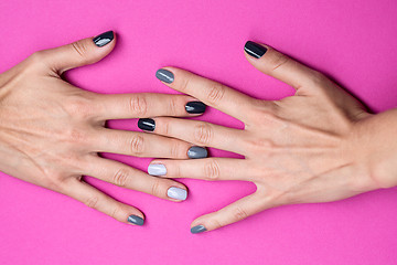 Image showing Delicate female hands with a stylish neutral manicure