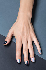 Image showing Female hand with a stylish neutral manicure