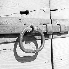 Image showing europe old in  italy  antique close brown door and rusty lock  c