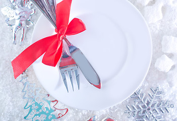 Image showing fork and knife on white plate