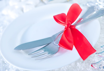 Image showing fork and knife on white plate