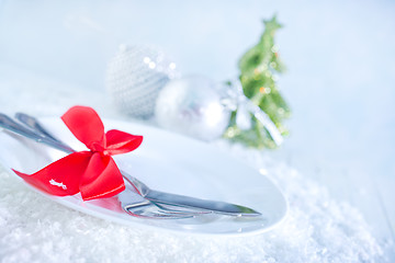 Image showing fork and knife on white plate