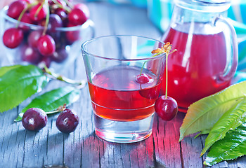 Image showing cherry juice and berries