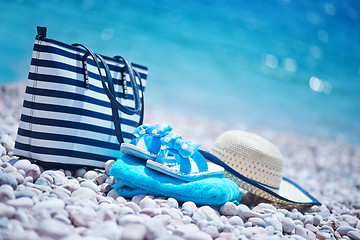 Image showing bag and hat on the beach