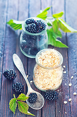 Image showing oat flakes with black berries 