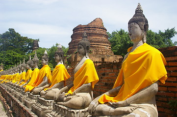 Image showing Buddhas in a row