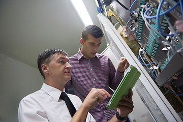 Image showing network engineers in server room