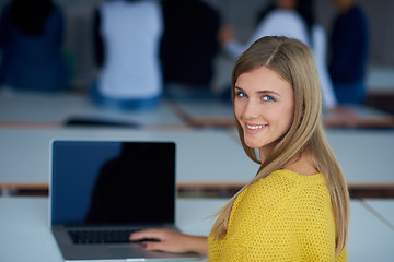 Image showing portrait of happy smilling student girl at tech classroom