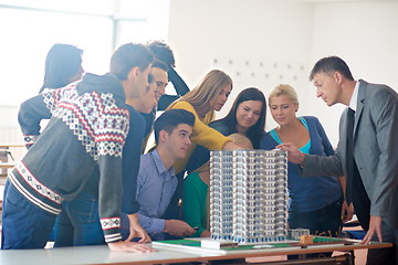 Image showing group of students with teacher on class