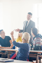 Image showing group of students with teacher on class